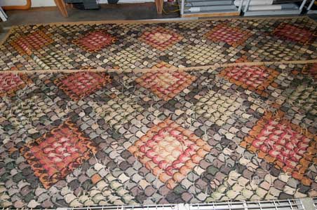 Cleaning rugs of the MDM system